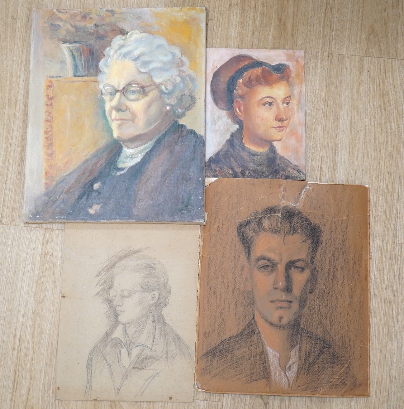 Ernest Waldron West (1904-1994), four works comprising, oil on canvas, Portrait of an elderly lady, two charcoal/pencil sketches on board, Study of a lady and study of a gentleman, possibly self portrait and oil on board